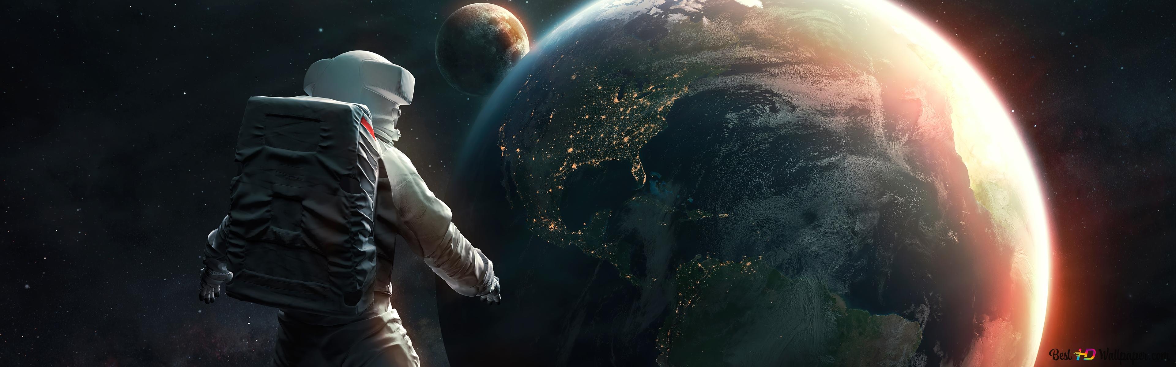 Astronaut in space watching earth wallpaper 3840x1200 62