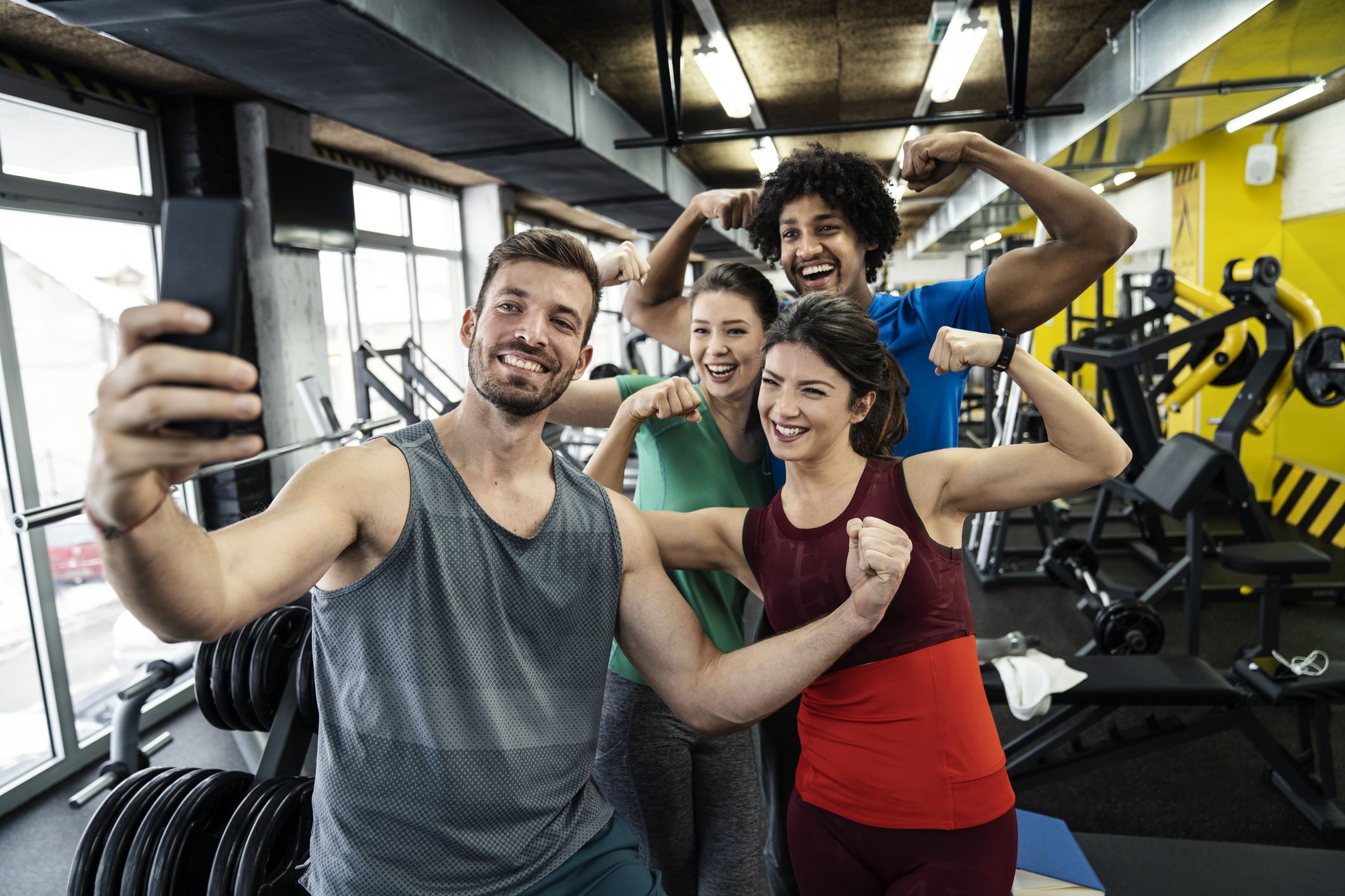 Athletic friends taking a selfie at the gym royalty free image 1570096636