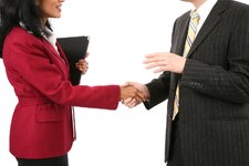 business-handshake-174645708-579a419b5f9b589aa92873e3.jpg